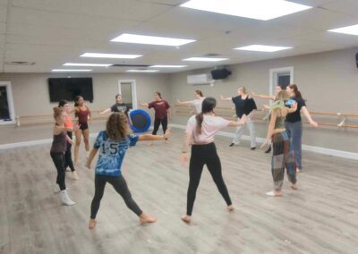 A group womens doing the dance practice on the floor